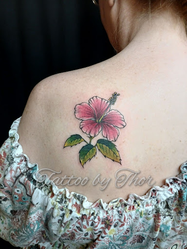 Explore flower tattoo ideas for guys, creative tattoo ideas in San Tan Valley, available at Frontier Tattoo Company
