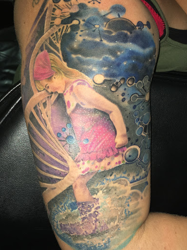 Find boob tattoo ideas for females for your next unique tattoo in Savannah at Tatlyfe Studios
