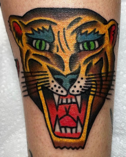 Explore tramp stamp lower back tattoo cover up ideas, creative tattoo ideas in Paducah, available at Third Moon Tattoos