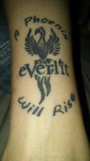 Explore angel name tattoo ideas, creative tattoo ideas in Holly, available at Loyalty Tattoo Company