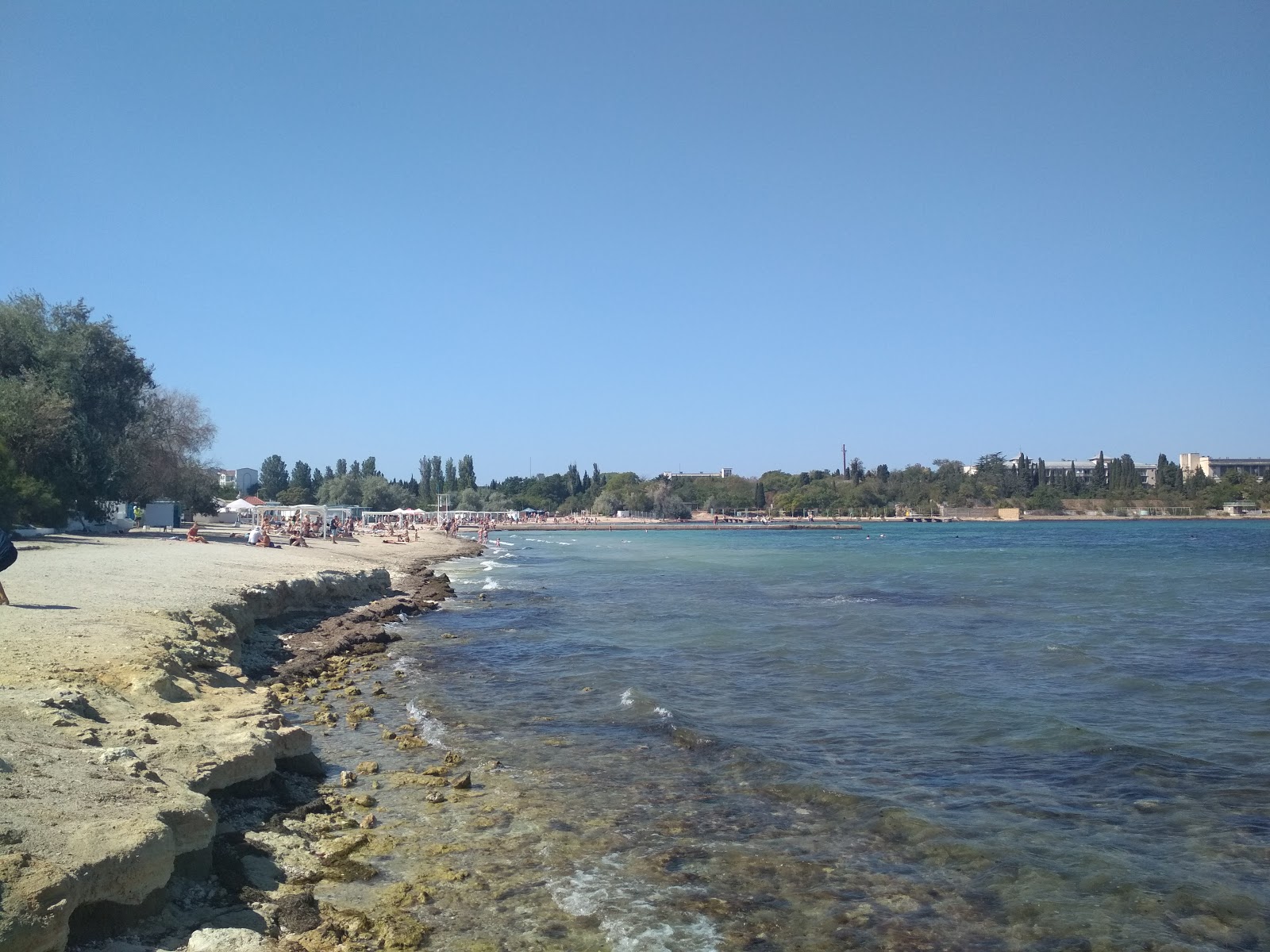 Omega beach'in fotoğrafı çok temiz temizlik seviyesi ile