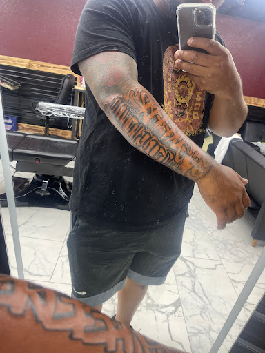 Explore hairdresser tattoo ideas, creative tattoo ideas in Apple Valley, available at Saints X Sinners Tattoo