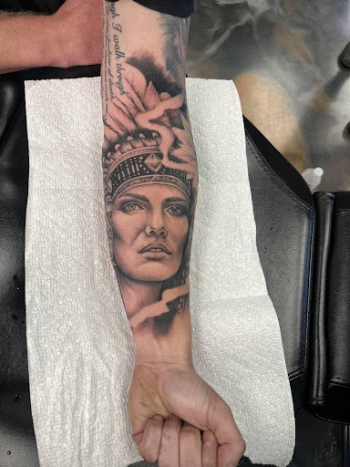 Explore throat tattoo ideas for men, creative tattoo ideas in Cincinnati, available at UniquInk Tattoos & Piercings