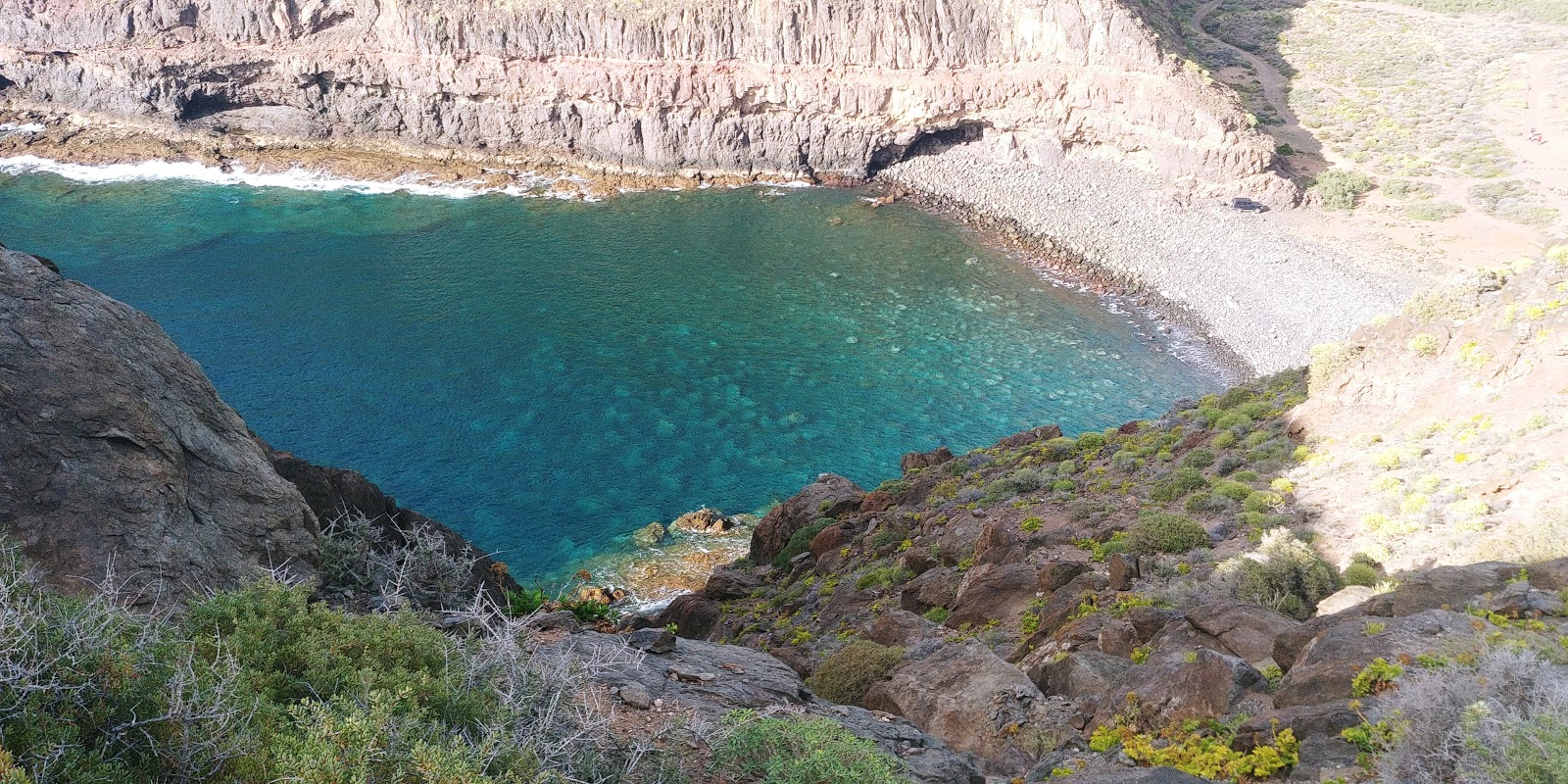 Zdjęcie Playa del Juncal z powierzchnią niebieska czysta woda