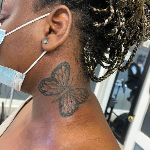 Explore tribal cross tattoo ideas, creative tattoo ideas in Sanford, available at Luv Ink