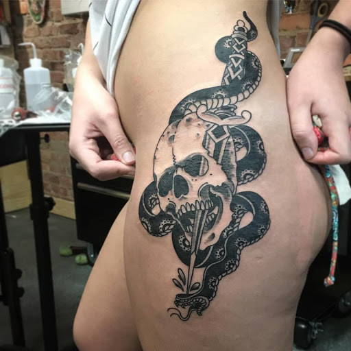 Explore rave tattoo ideas, creative tattoo ideas in Dunn, available at Heart and Hammer Tattoo Co.