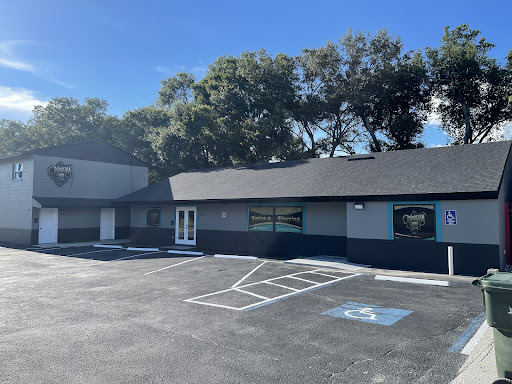 Find book of tattoo ideas for your next unique tattoo in Lake Alfred at Moreira Ink