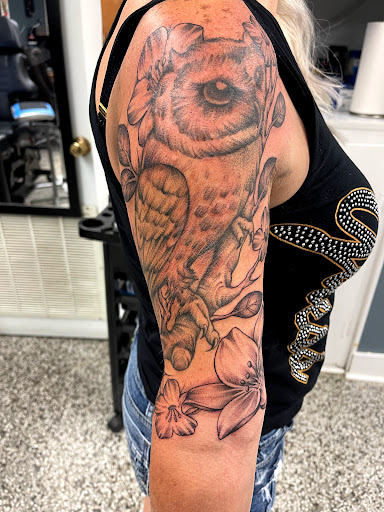 Explore indian feather tattoo ideas, creative tattoo ideas in Sanford, available at Luv Ink