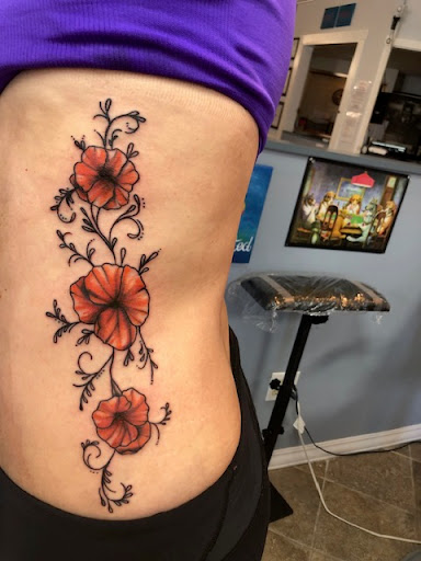 Explore grieving tattoo ideas, creative tattoo ideas in Nashua, available at Mayhem Ink Tattoo