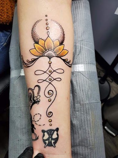 Explore butterfly vine tattoo ideas, creative tattoo ideas in Knoxville, available at Archangel Custom Ink Tattoo & Piercing