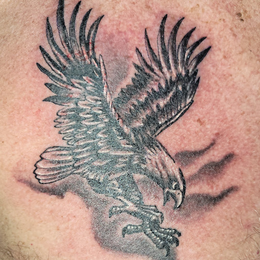 Explore mickey mouse tattoo ideas, creative tattoo ideas in Angola, available at Hoodlum Ink