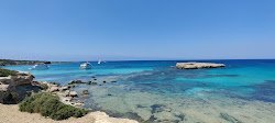 Foto von Amphitheatre Bay umgeben von Bergen
