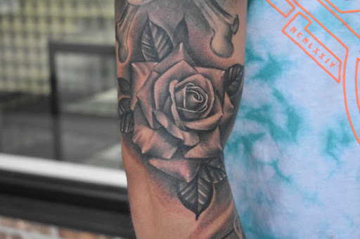 Explore country music tattoo ideas, creative tattoo ideas in Warrenville, available at UpRise Tattoos