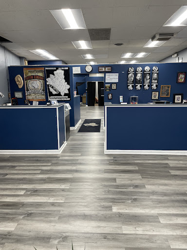 Explore cover up tattoo ideas female leg, creative tattoo ideas in Glen Burnie, available at Exotic Pleasures Tattoo & Piercing