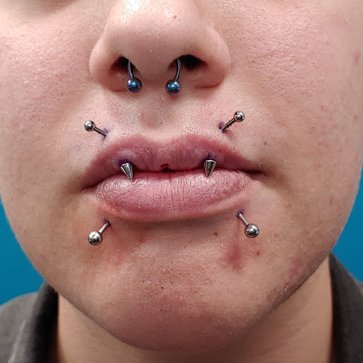 Explore the outsiders tattoo ideas, creative tattoo ideas in San Marcos, available at Ollie the Impaler Body Piercing