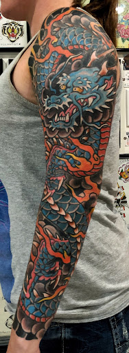 Explore back tattoo ideas for men, creative tattoo ideas in Fort Worth, available at Randy Adams Tattoo Studio