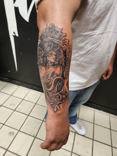 Explore tattoo ideas on back of neck, creative tattoo ideas in Hereford, available at Slow Pain Tattoo Body Art Studio