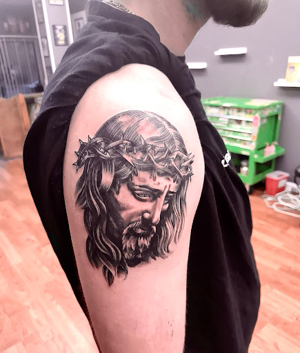 Explore tattoo ideas for 2 sons, creative tattoo ideas in Shelbyville, available at Stage Left Tattoo and Piercing