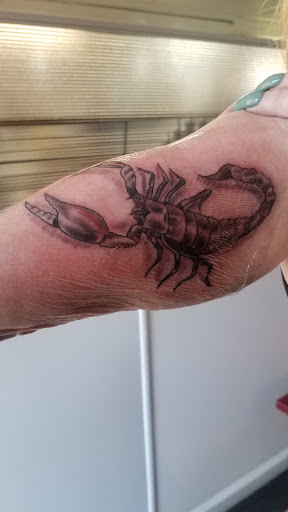 Find best hand tattoo ideas for your next unique tattoo in Yorktown at Army Navy Tattoo