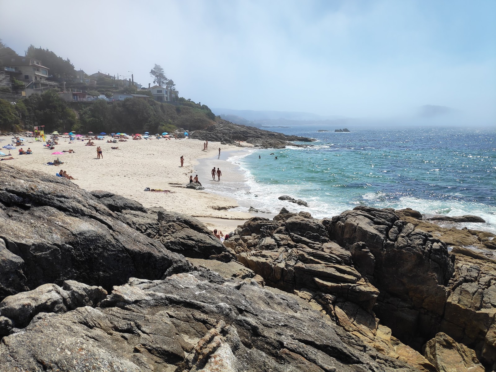 Praia dos Muinos'in fotoğrafı küçük koy ile birlikte