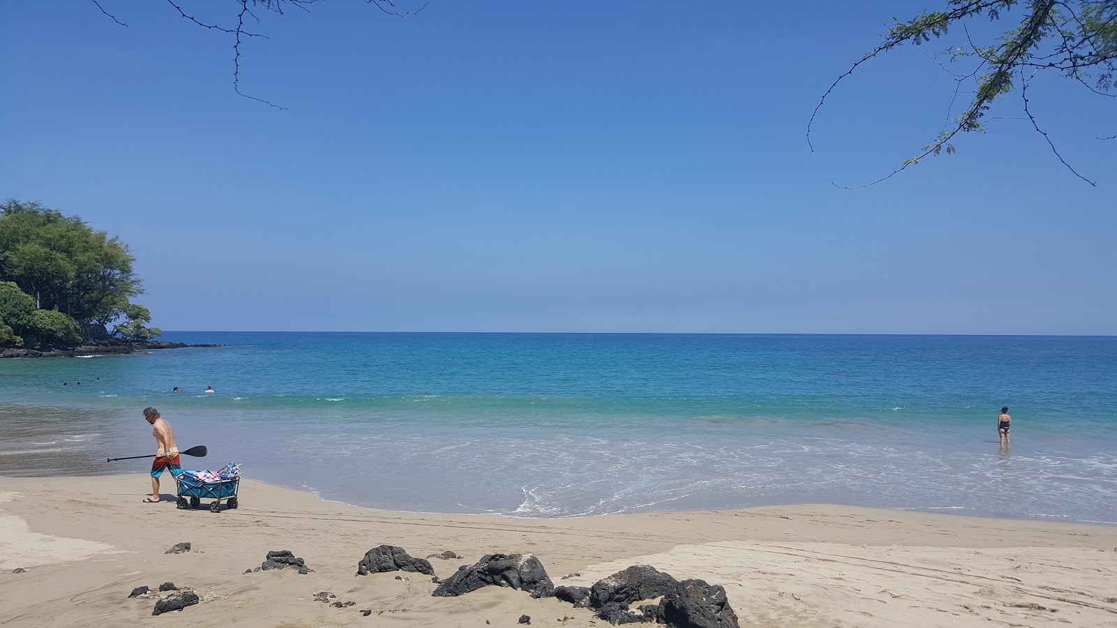 Foto av Mau'umae Beach med turkosa vatten yta