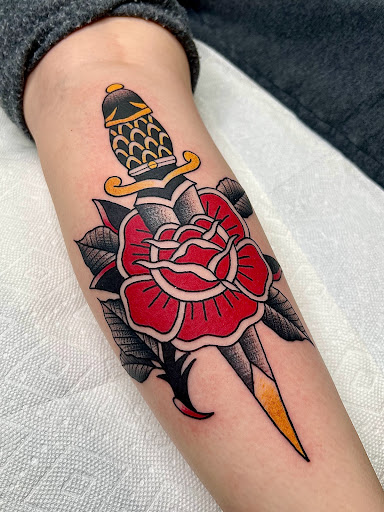 Explore clock hand tattoo ideas, creative tattoo ideas in Elkin, available at Black Bear Tattoo