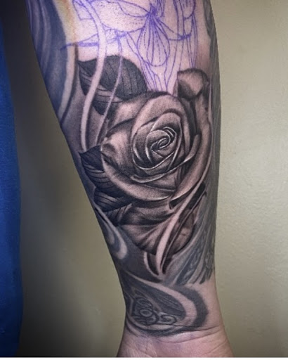 Explore ancient greek tattoo ideas, creative tattoo ideas in Amherst, available at Wanderlust Tattoo & Piercing