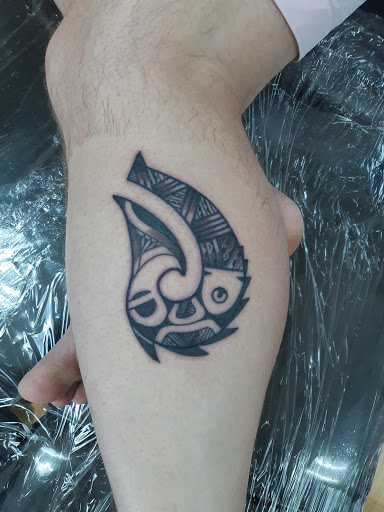 Find in between breast tattoo ideas for your next unique tattoo in Lahaina at Sweet Trade Tattoo