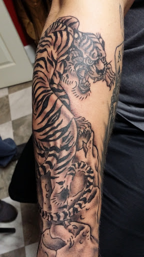 Explore father and son tattoo ideas, creative tattoo ideas in Paducah, available at The Tattoo Shop