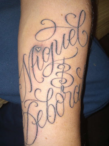 Explore pink floyd tattoo ideas, creative tattoo ideas in Whittier, available at Uptown Tattoos & Piercing