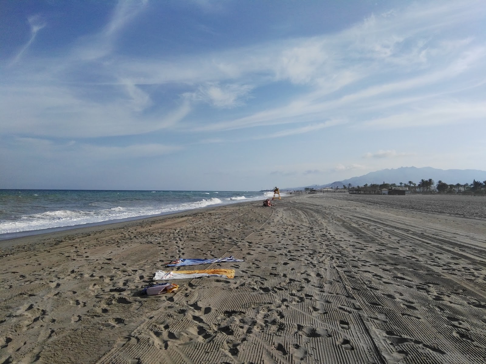 Foto av Playa de Puerto del Rey med blått vatten yta