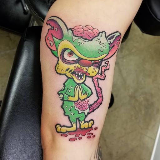 Explore tattoo ideas for lower stomach, creative tattoo ideas in Painesville, available at The Inkwell Tattoo Company
