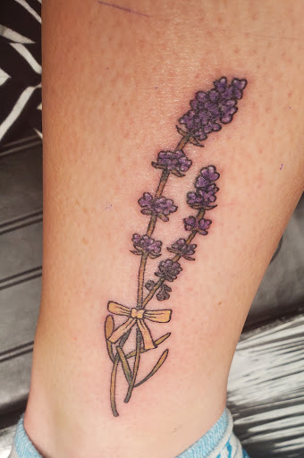 Explore brain cancer tattoo ideas, creative tattoo ideas in Madison, available at Blue Lotus Tattoo & The Piercing Lounge