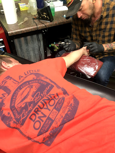 Explore rose tattoo ideas for females, creative tattoo ideas in Hernando, available at Blue Panther Tattoo Co