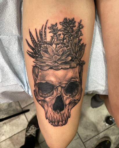 Explore cheating death tattoo ideas, creative tattoo ideas in Erie, available at Code of Honor Tattoo