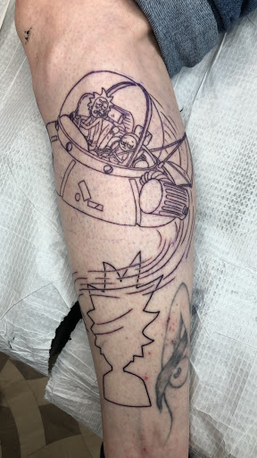 Explore bum tattoo ideas, creative tattoo ideas in Jacksonville, available at Electric Legacy Tattoo