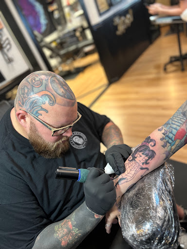 Explore thigh tattoo ideas men, creative tattoo ideas in Tarpon Springs, available at Legendary Custom Tattoos and Piercings