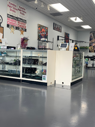 Find tattoos in between breast ideas for your next unique tattoo in Meridian at Creative Pain Tattoo Studio