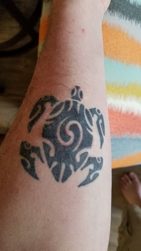 Explore cool guitar tattoo ideas, creative tattoo ideas in Lahaina, available at Sweet Trade Tattoo