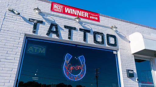 Explore cover up tattoo ideas lower back, creative tattoo ideas in Virginia Beach, available at World Famous Blue Horseshoe Tattoo and Piercing Independence