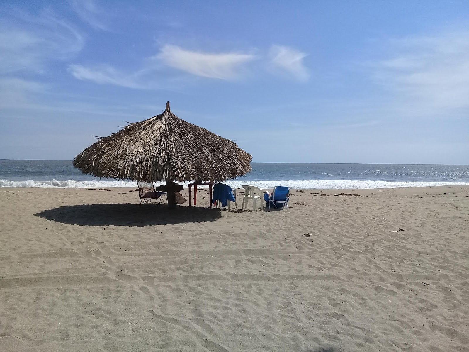 Foto av Playa Valentin med turkosa vatten yta