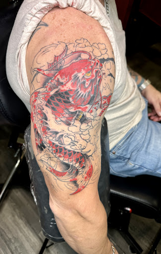 Explore george strait tattoo ideas, creative tattoo ideas in Hoschton, available at The Golden Mantis Tattoo & Piercing