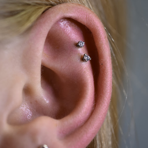 Find time tattoo ideas for your next unique tattoo in Reno at Black Hole Body Piercing