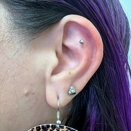 Explore tribal cover up tattoo ideas, creative tattoo ideas in Duncanville, available at Studio Fourteen Tattoos