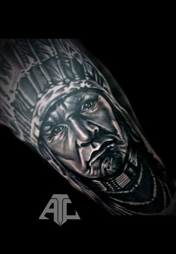 Explore knee scar tattoo ideas, creative tattoo ideas in Altoona, available at Catharsis Tattoo Gallery