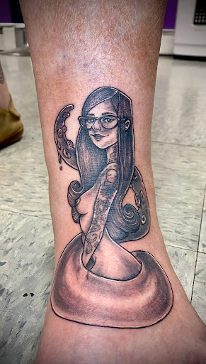 Explore hourglass tattoo ideas, creative tattoo ideas in Goshen, available at Lady Luck Studio