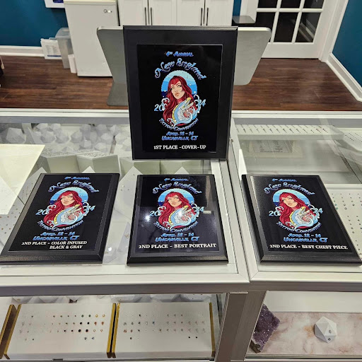 Explore boxer dog tattoo ideas, creative tattoo ideas in Worcester, available at Elegance Piercing & Tattoo Inc.