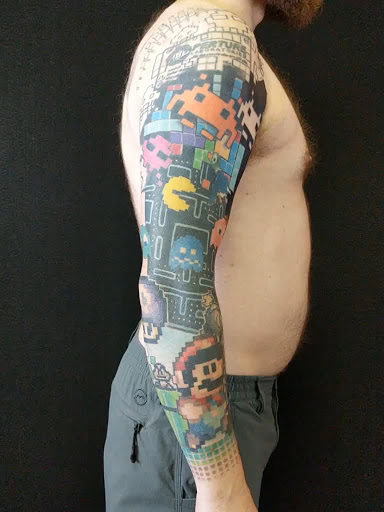 Explore computer tattoo ideas, creative tattoo ideas in Bradenton, available at Sacred Arts Tattoo Bradenton