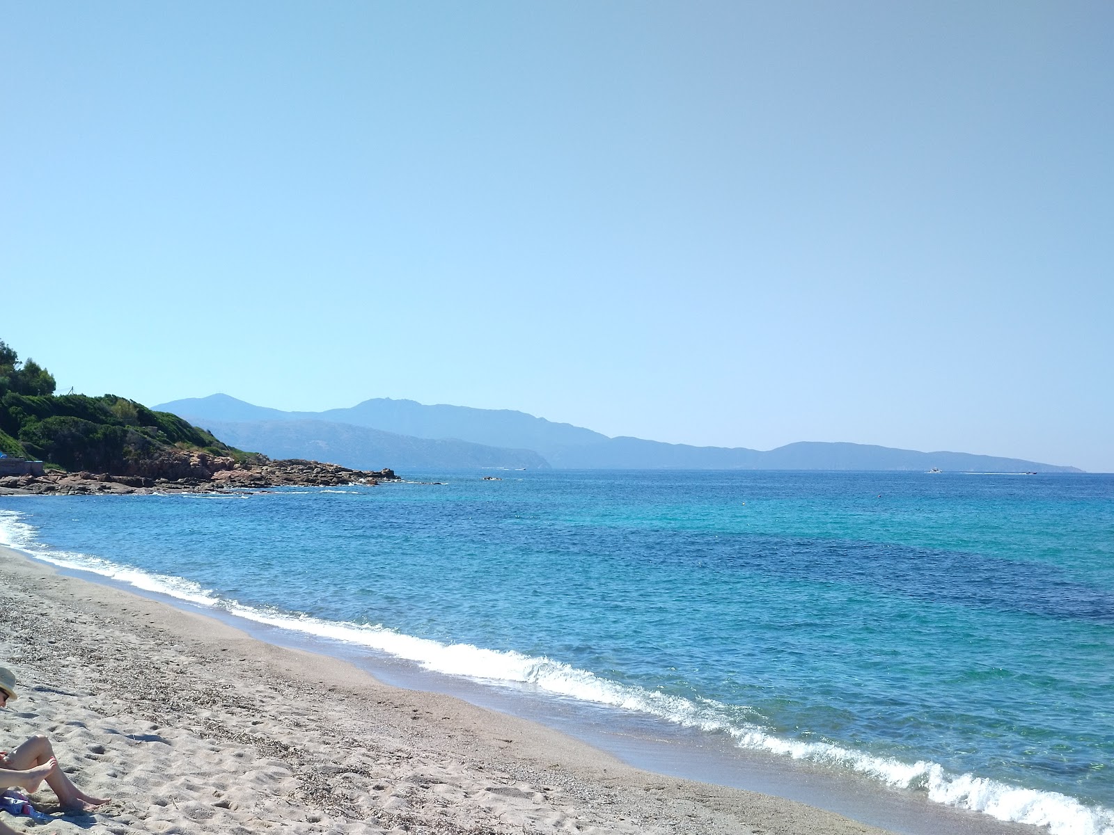 Photo of Stagnoli beach with turquoise pure water surface