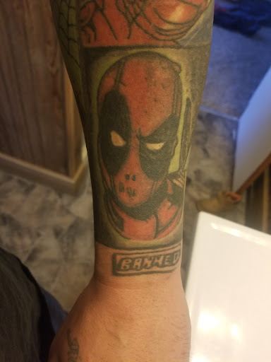 Explore y2k tattoo ideas, creative tattoo ideas in Sioux City, available at Tattoo Monkey